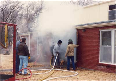 Pawnee Rock Christian Church burns on December 19, 1991. Photo copyright 1991 by Elgie Unruh.