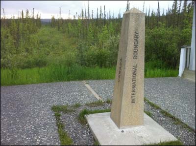 The boundary marker on the Alaska Highway. Photo copyright 2011 by Leon Unruh.