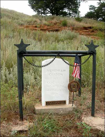 Private Nehemiah Carson, a 20-year-old from Missouri, is remembered with a marker on Pawnee Rock. He died during the Mexican-American War in 1846. Photo copyright 2010 by Leon Unruh.