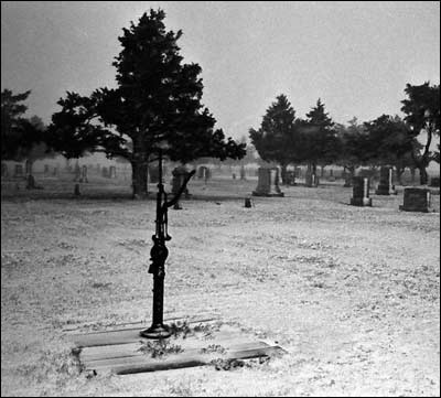 Pawnee Rock Cemetery pump, 1974. Photo copyright 2010 by Leon Unruh.