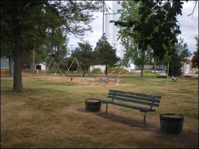 The Pawnee Rock city park has playground equipment and a nice place where parents can sit and listen to the children and cicadas. Photo copyright 2010 by Leon Unruh.