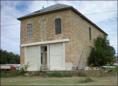 A building on a side road in Coolidge. Photo copyright 2011 by Leon Unruh.