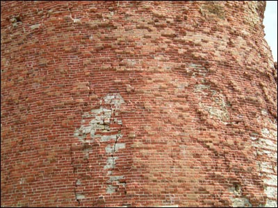 The brick water tower rises on relatively high ground on the north side of Coolidge. Photo copyright 2010 by Leon Unruh.