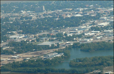 The Barton County Courthouse appears in the as the white squarish building at the one o'clock position in this photo. Photo copyright 2010 by Jim Dye.