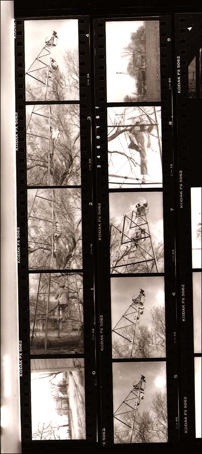 Elgie Unruh climbs a windmill on his family farm. Photo copyright 2013 by Leon Unruh.