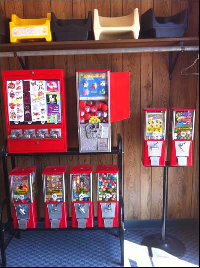 Candy and trinket dispensers at the Don Do Cafe in Larned. August 2010. Photo copyright 2010 by Leon Unruh.