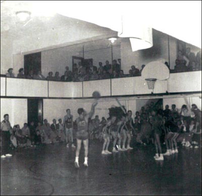 Ed Durall shoots a free throw in the Pawnee Rock High School gym in 1954. The photo was made by his father.