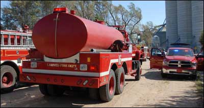 Larned and Great Bend trucks were side by side. Photo copyright 2010 by Jim Dye.