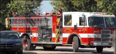 Great Bend's truck pulls onto Flora Avenue. Photo copyright 2010 by Jim Dye.