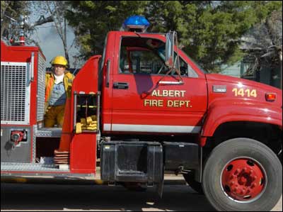 Albert sent a truck and water. Photo copyright 2010 by Jim Dye.