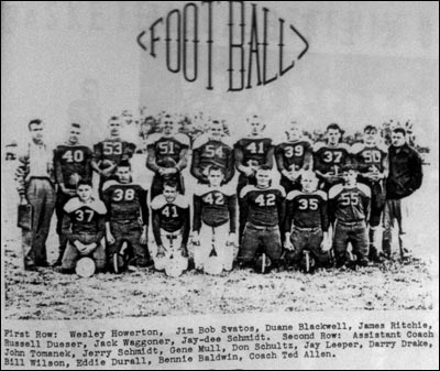 Pawnee Rock High School's football team in the fall of 1953: Front row: Wesley Howerton (37), Jim Bob Svatos (38), Duane Blackwell (41), James Ritchie (42), Russell Dueser (42), Jack Waggoner (35), and Jay-dee Schmidt (55). Second row: Assistant coach John Tomanek, Jerry Schmidt (40), Gene Mull (53), Don Schultz (51), Jay Leeper (54), Derry Drake (41), Bill Wilson (39), Eddie Durall (37), Bennie Baldwin (50), and Coach Ted Allen.