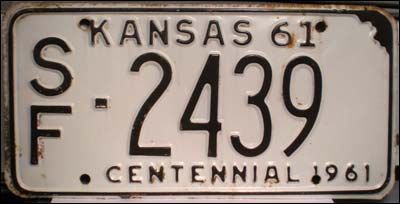 Kansas license tag, Stafford County, 1961 centennial plate. Photo copyright 2009 by Leon Unruh.