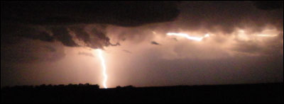 Lightning in Barton County. Photo copyright 2010 by Leon Unruh.