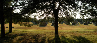 The cemetery behind Peace Lutheran Church, an evening in August. Photo copyright 2010 by Leon Unruh.