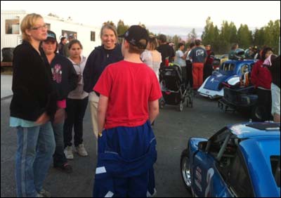 Nik Unruh meets new fans after his victory at North Pole Speedway. Photo copyright 2010 by Leon Unruh.