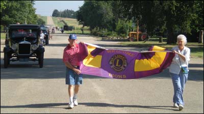 Howard Bowman and Janice Schmidt lead last year's parade down Centre Street from the north side of town. Photo copyright 2011 by Leon Unruh.