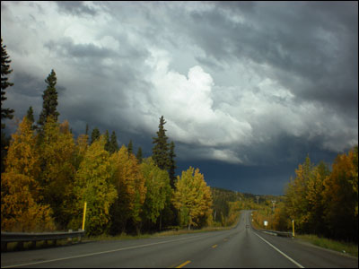 Driving into rain on Alaska Highway 3 near Fairbanks. Photo copyright 2009 by Leon Unruh.