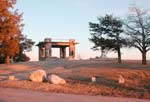 Photo of Pawnee Rock pavilion at sunset. Copyright Leon Unruh 2005.
