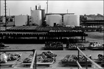 A pipeyard along U.S. 56 held a lot of unused material during an oil bust around 1990. Photo copyright 2009 by Leon Unruh.