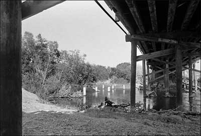 Under the Pawnee Rock Bridge, 1974, looking east across the Arkansas River. Photo copyright 2009 by Leon Unruh.