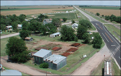 A yard east of the big elevator holds pipes waiting to be used. This photo was made in 2005. Photo copyright 2009 by Leon Unruh.