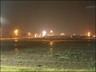 Empty lot in the rain in Great Bend, August 2006. Photo copyright 2009 by Leon Unruh.