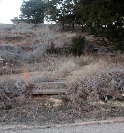 Concrete stairs on the east side of Pawnee Rock. Photo copyright 2010 by Leon Unruh.