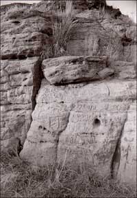 Carvings in the Pawnee Rock sandstone. Photo copyright 2010 by Leon Unruh.