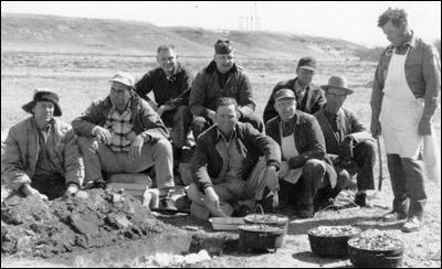 Jim Wilhite is second from the left (looking to the left); Wendell Binder is seated in the middle; my dad Paul Schmidt is seated furthest to the right (open crown felt cowboy hat); Leslie Deckert is behind my dad (dark baseball cap).  Photo sent by Barb Schmidt.