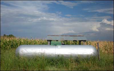 Propane fuels an irrigation pump watering corn at the intersection. Photo copyright 2010 by Leon Unruh.