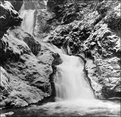 Thunderbird Falls, Chugach State Park, Alaska. Photo copyright 1995 by Leon Unruh.