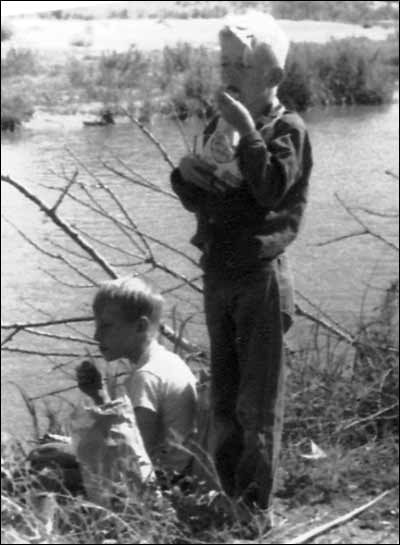 Scouts savor a snack along the Pawnee River in 1951. Photo sent by Barb Schmidt.