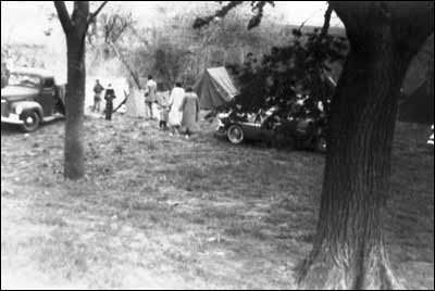 Visitors approach the campsite of Troop 174 at Camp Pawnee, 1951. Photo sent by Barb Schmidt.