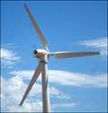 Wind turbine spins near the Great Bend airport. Photo copyright 2010 by Leon Unruh.